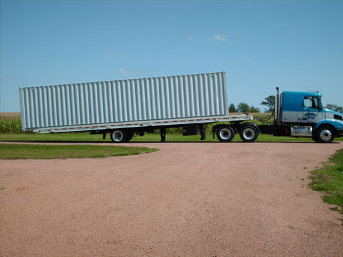 A truck dropping off one of our mobile storage units